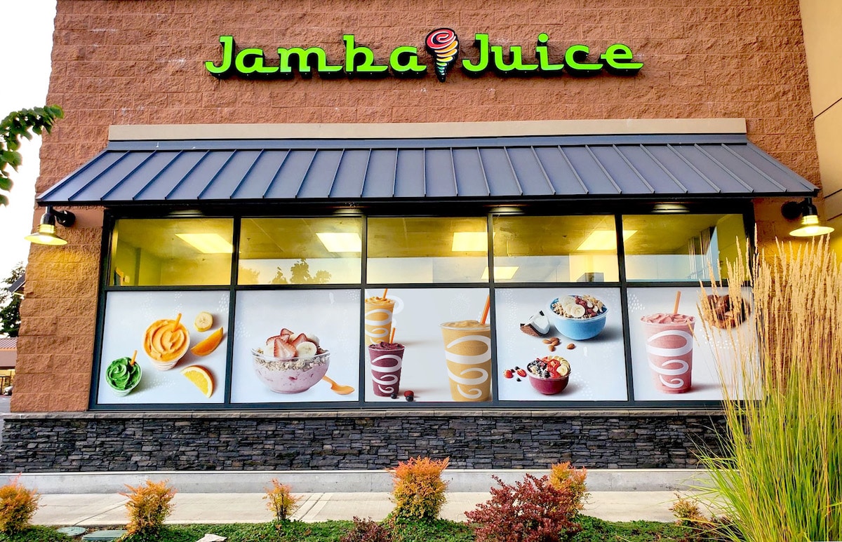window graphic images of smoothies and fruit on a jamba juice storefront